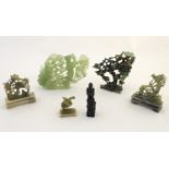 A quantity of Oriental soapstone carvings comprising a model of birds in a tree, birds amongst