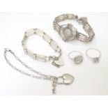 Assorted jewellery to include a silver bracelet set with a threepence coin, the bracelet
