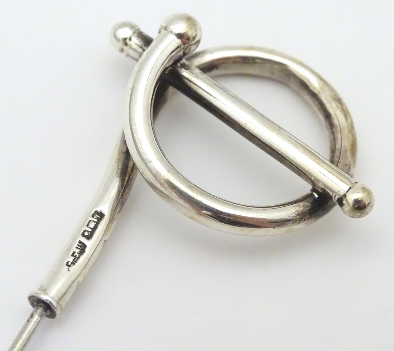 A silver hat pin with scroll decoration hallmarked 1908, maker G. E. Walton & Co. Ltd. Approx. 9 1/ - Image 5 of 8