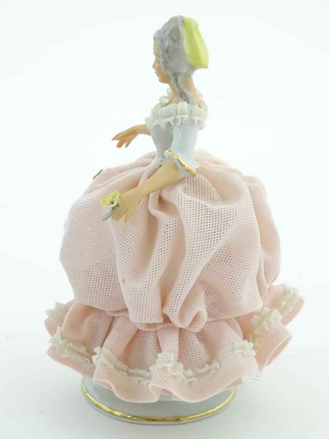 A Dresden model of a lady with a porcelain lace dress. Marked under. Approx. 5 3/4" high Please Note - Image 5 of 6