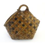 Ethnographic / Native / Tribal : A woven basket. Approx. 15" high x 16 1/2" wide Please Note - we do
