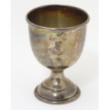 A silver egg cup, hallmarked Birmingham 1961, maker Robert Pringle & Sons. Approx. 2 1/2" high