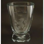 A Scandinavian glass vase with engraved rampant lion decoration. In the manner of Elis Bergh for