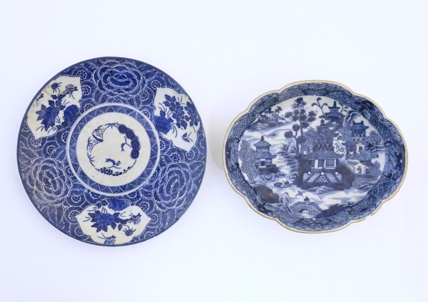 An Oriental blue and white plate with stylised peony detail, and stylised scrolling flower motifs to - Image 2 of 8
