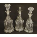 Three various glass decanters and stoppers. the largest 12 3/4" high overall (3) Please Note - we do