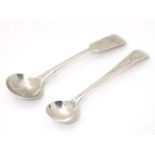 Two silver salt spoons, one fiddle pattern hallmarked Exeter 1858 maker JS, the other Old English