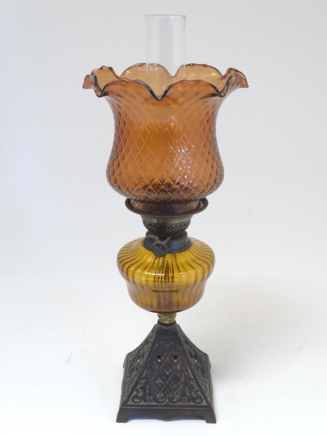 A late 19thC Duplex oil lamp, with bronzed glass shade and reservoir, standing on a cast iron base - Image 2 of 24