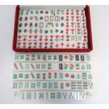 Toys: Late 20thC Mahjong tiles, cased. Case approx. 13 1/2" x 8 1/2" Please Note - we do not make