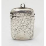 A Victorian silver vesta case with engraved decoration. hallmarked Birmingham 1895 maker Joseph