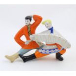 A USSR / Ukrainian model of two dancers with a Russian accordion by Polonsky Factory of Artistic