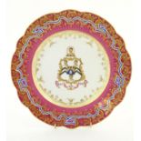 A John Ridgway & Co. armorial plate with scalloped edge and central crest Ora Et Labora. Marked
