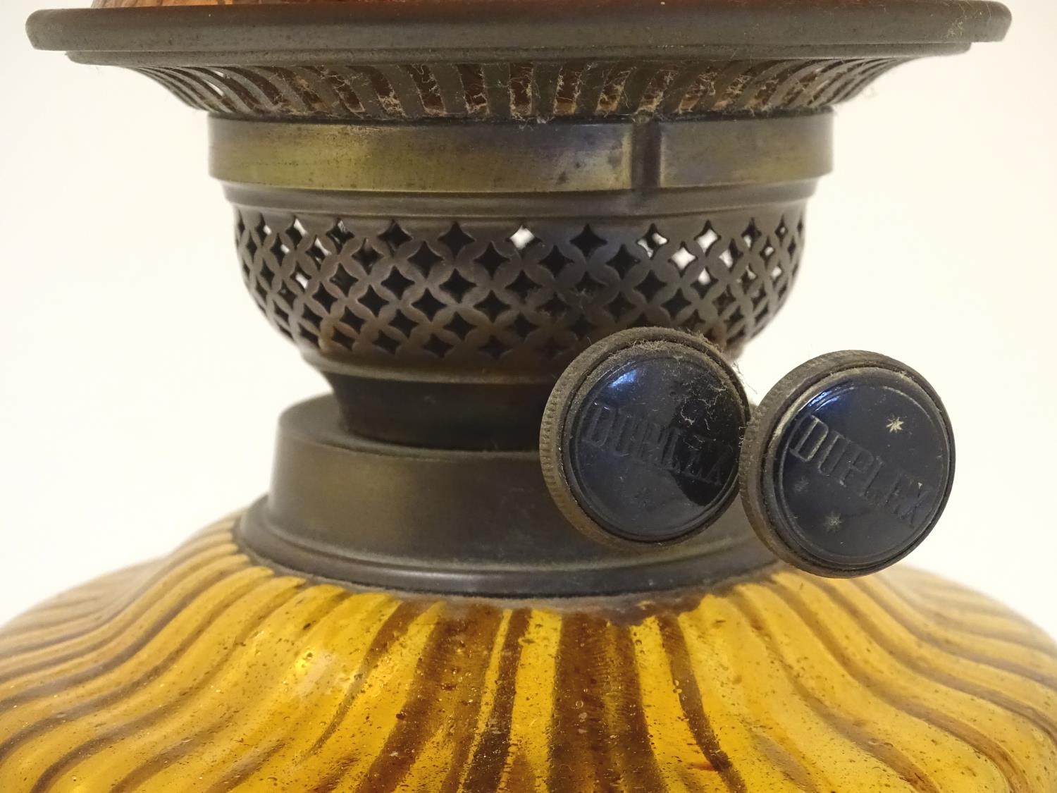 A late 19thC Duplex oil lamp, with bronzed glass shade and reservoir, standing on a cast iron base - Image 20 of 24