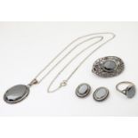 Assorted silver and white metal jewellery comprising earrings, pendant brooch etc. The brooch