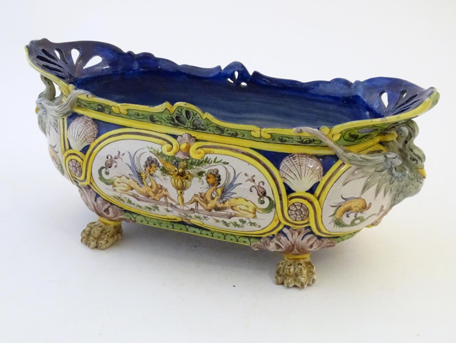 An Italian faience planter of oblong form on claw feet with panelled grotesque decoration - Image 3 of 13