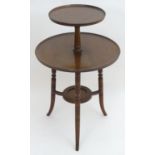 A late 19thC Aesthetic movement dumb waiter / tea table attributed to E.W Godwin. For similar see '