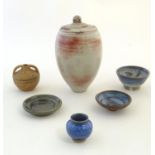 A quantity of assorted studio pottery wares comprising a lidded vase with RW maker's mark,