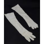 A pair of Edwardian white kid leather gloves. Approx. 20 1/2" long Please Note - we do not make