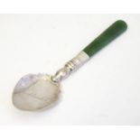 A silver souvenir spoon with a New Zealand jade nephrite handle, the bowl engraved Auckland N. Z.