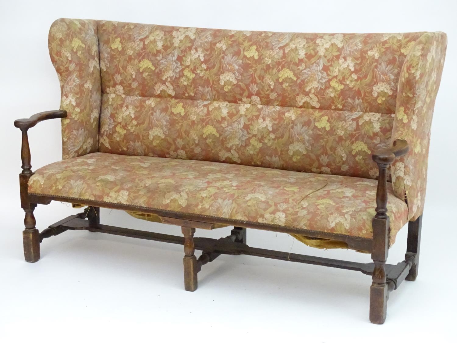 A mid 18thC wingback sofa with scrolled arms and an upholstered backrest and seat above a - Image 5 of 12