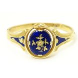 A 19thC yellow metal bracelet of bangle form with blue enamel and foliate detail and snake / serpent
