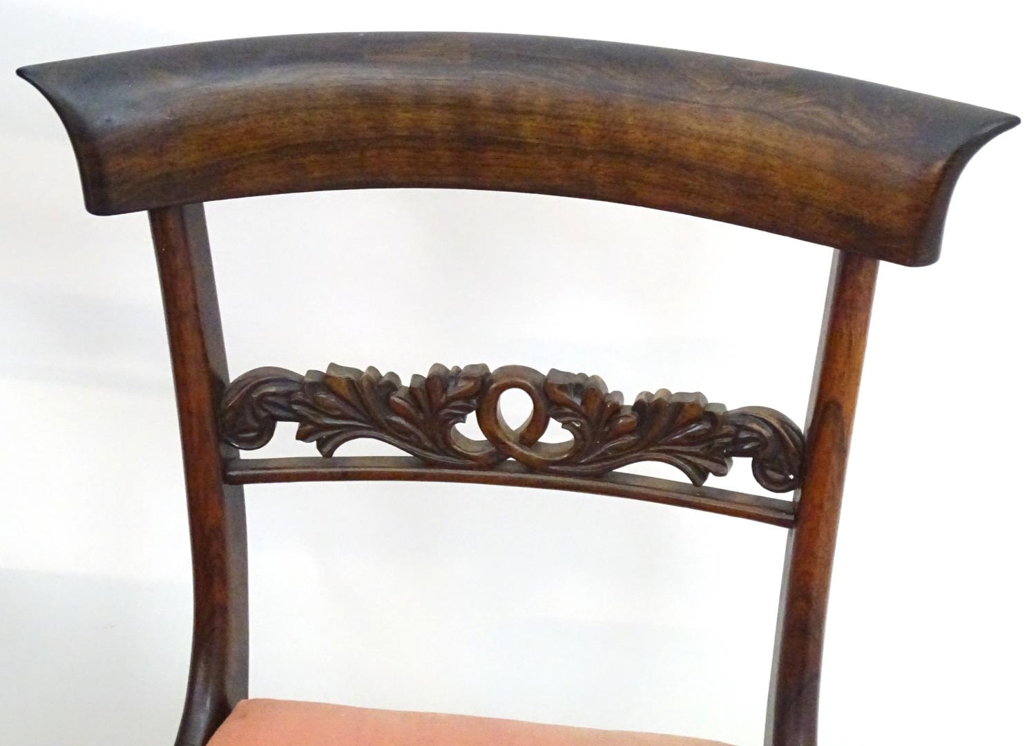 A set of four William IV rosewood dining chairs with shaped top rails, pierced mid rails, drop in - Image 6 of 14