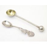 Two silver salt spoons, one hallmarked London 1907, maker Samuel Jacob, the other a Continental