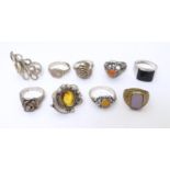 A quantity of assorted silver and white metal dress rings etc. (9) Please Note - we do not make