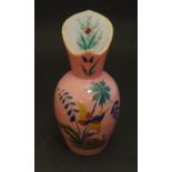 A 19thC art glass vase, with milk glass interior and pink exterior, decorated with enamelled