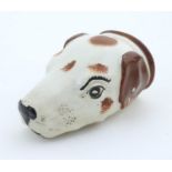 A Victorian Staffordshire pottery stirrup cup formed as the head of a dog / hound. Approx. 4 1/2"