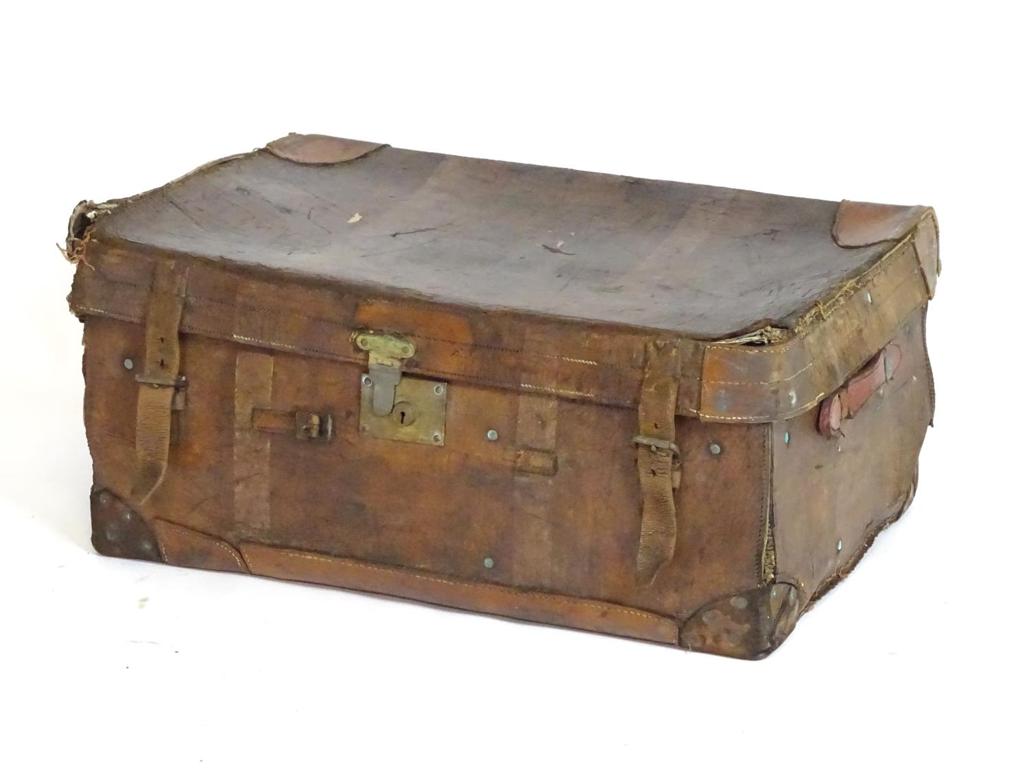 A late 19th / early 20thC leather travelling trunk with two carry handles. Approx. 14" x 32" x 21" - Image 4 of 4