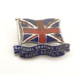 A pine / badge / brooch with union jack details titled 'National Skating Assoc. Great Britain' 1"