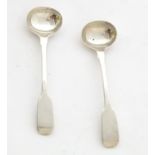 A pair of early 19thC silver fiddle pattern salt spoons, hallmarked London 1831, maker