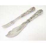 Two Victorian silver servers comprising fork and knife/slice, the handles with corn decoration,