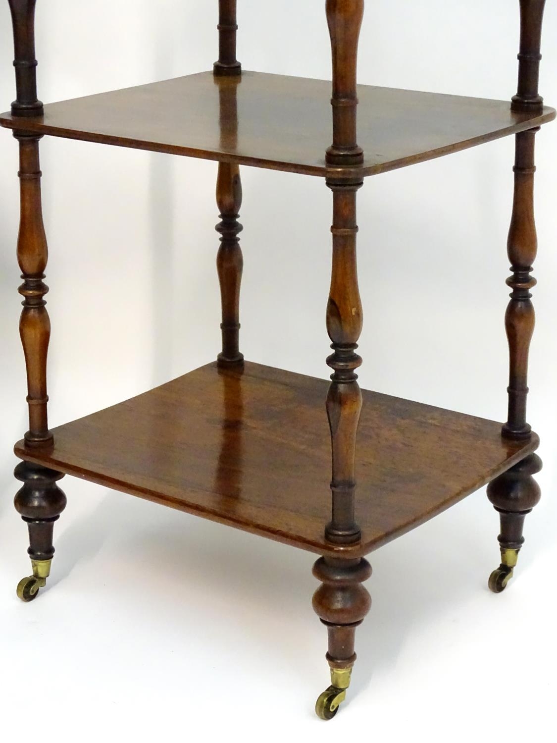 A pair of regency rosewood whatnots with turned finials to the tops and three tiers united by turned - Image 9 of 15