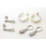 Three pairs of .925 silver earrings set wit, two pair being drop earrings set with various stones,
