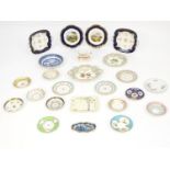 A quantity of assorted 19thC and later ceramics to include floral and foliate saucers, cabinet