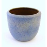 A Bretby style planter with a mottled blue glaze. Approx. 7" high Please Note - we do not make
