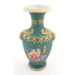 A Prattware baluster vase with Classical decoration depicting a Roman gladiator and chariot etc.