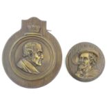 A Victorian cast bronze tampion plaque depicting the bust of The Duke of Wellington in profile