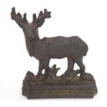 A 20thC cast doorstop / door porter modelled as a stag. Approx. 8 1/4" high Please Note - we do