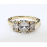 A 9ct gold ring set with trio of ova cut white stones. Ring size approx. Q 1/2 Please Note - we do
