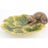 A Victorian majolica leaf plate with moulded cat detail. Approx. 11 1/2" wide Please Note - we do