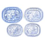 Four assorted blue and white meat plates in the Willow pattern. Largest 13 3/4" x 17 1/4" (4) Please