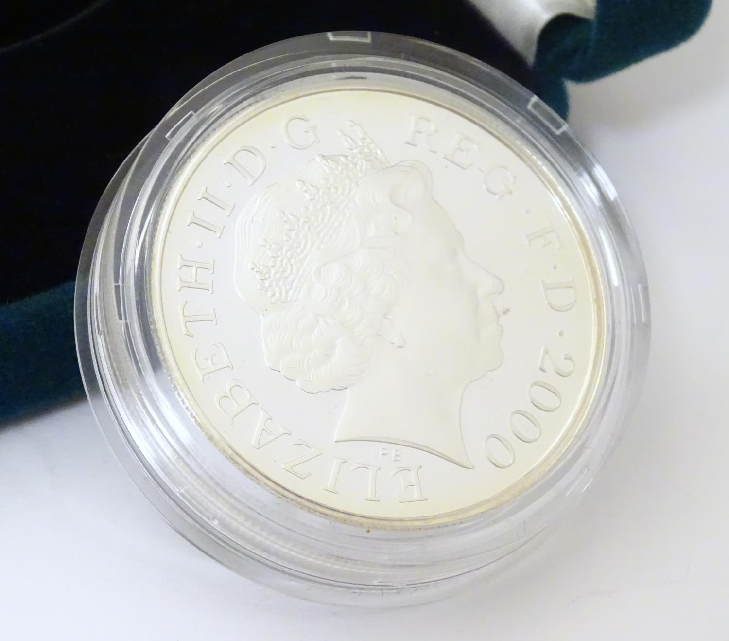 Coin: A Royal Mint 2000, sterling silver five pound piedfort proof crown coin, commemorating the - Image 4 of 5