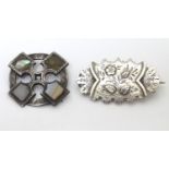 Two brooches to include one silver example hallmarked Birmingham 1892, approx. 1 1/2" wide (2)