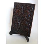 A 20thC carved oak panel decorated with birds amongst scrolling foliage. Approx. 12 1/4" x 8 3/4"