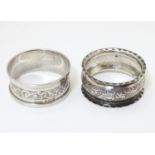 Two silver napkin rings, one hallmarked Birmingham 1944, maker Henry Griffiths & Sons, the other