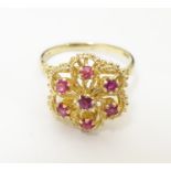 A 9ct gold ring set with ruby red spinel. Ring size approx P Please Note - we do not make