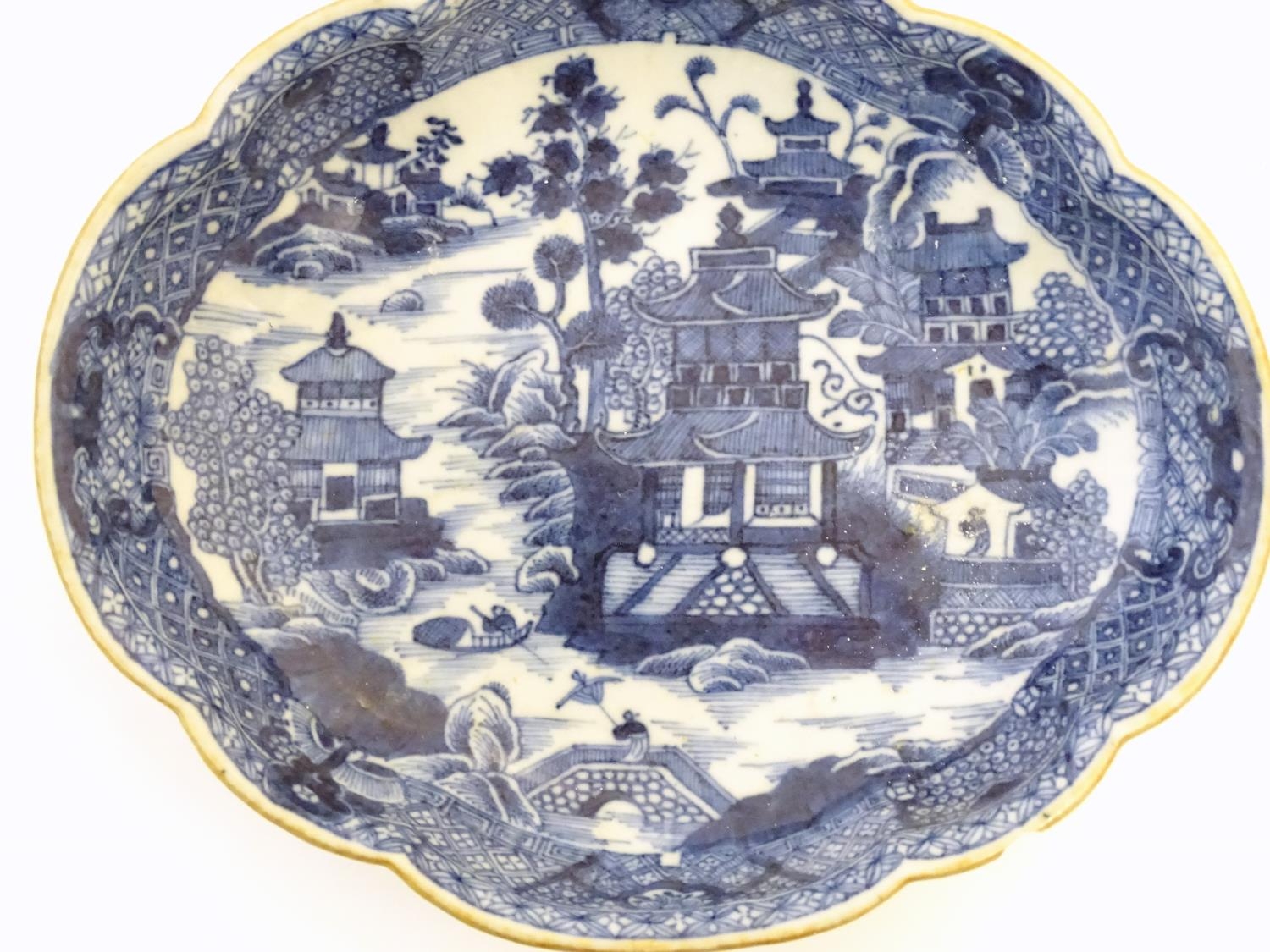 An Oriental blue and white plate with stylised peony detail, and stylised scrolling flower motifs to - Image 7 of 8