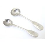 Two 19thC fiddle pattern salt spoons, one hallmarked London 1919, maker William Eaton, the other